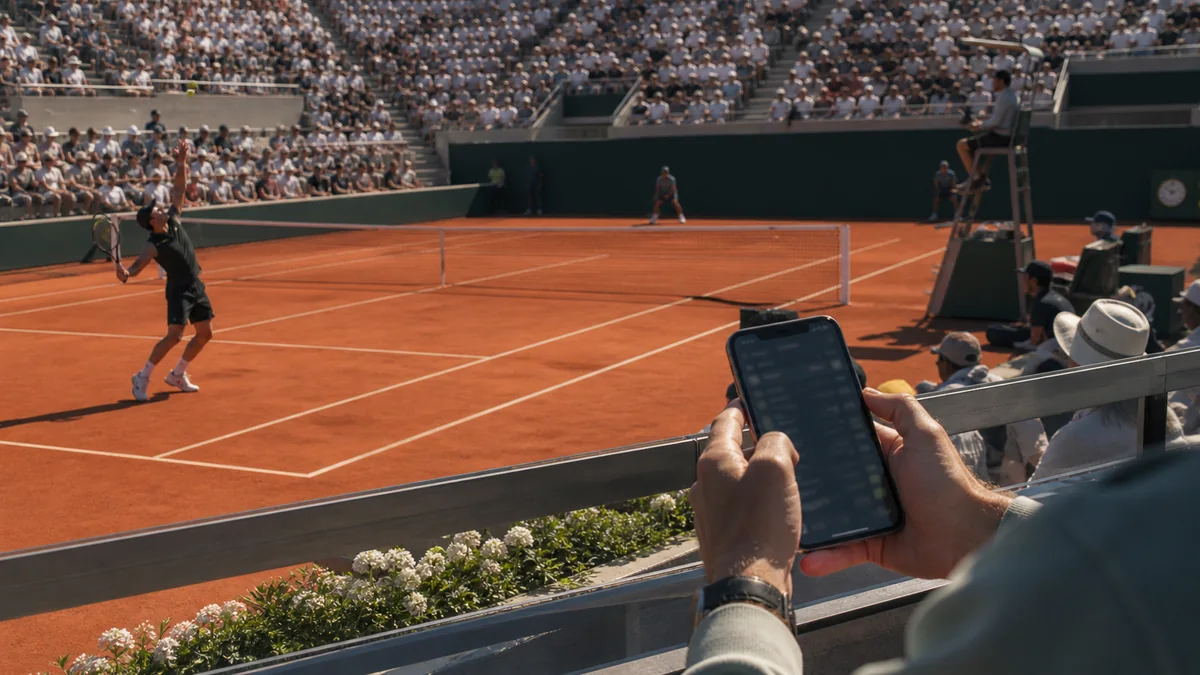 Meci de tenis urmărit împreună cu piețele disponibile pe mobil